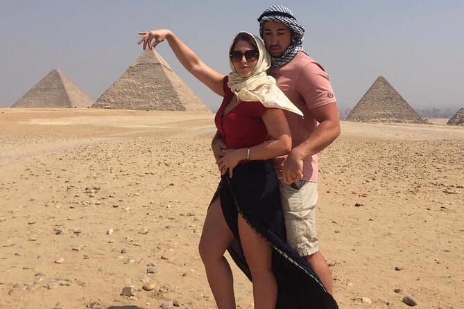 4 hour Private tour Giza pyramids ,sphinx and mummification temple tours - The high viewpoint and the classic pyramid photograph