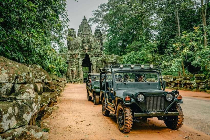 Angkor Wat: Guided Jeep Tour Inclusive lunch at local house - Ta Prohm, where trees take over the ruins