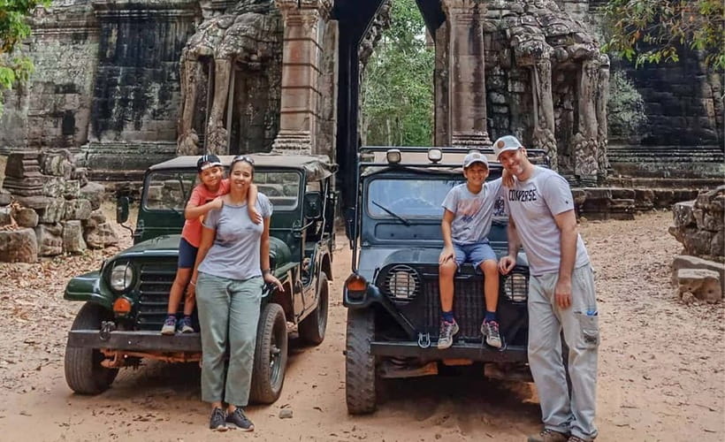 Angkor Wat: Guided Jeep Tour Inclusive lunch at local house - Entering Angkor Thom through the stone gate