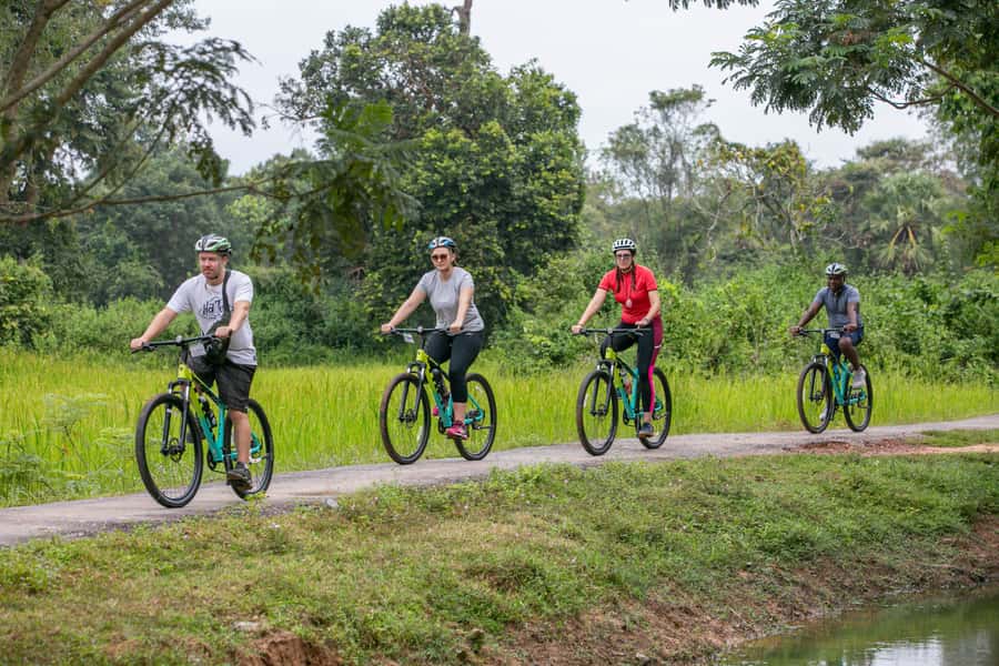 Angkor Wat: Guided Sunrise Bike Tour w/ Breakfast and Lunch - Lunch, local food, and the end of a long day