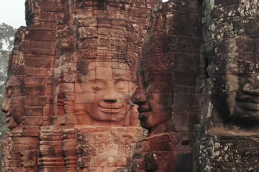 Angkor Wat & Temples: Private Spiritual Tour by Lady Tuk Tuk - Bayon and its calm stone faces