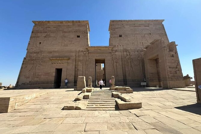 Aswan Day Tour: Philae Temple, Obelisk, High Dam & Nubian Village - Reaching Philae Temple by the Nile
