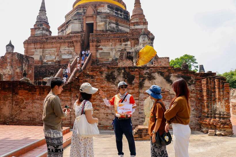 Ayutthaya One Day: Famous Temples & Bang Pa-In Palace Tour - Wat Maha That and the Buddha head in the tree roots