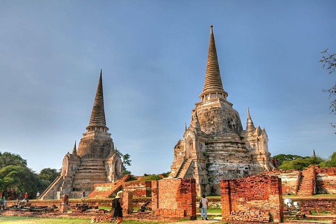 Ayutthaya’s Top Temple & Boat Tour From Bus Station - Wat Yai Chai Mongkhon and its long rows of Buddhas