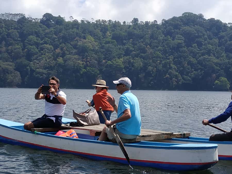 Bali: Munduk Waterfalls Trek, Twin Lakes and Temple Tour - Crossing Tamblingan Lake by wooden canoe