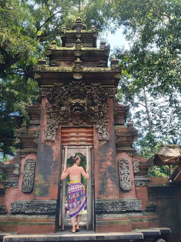 Bali: Rice terrace, Waterfall, and water Temple Day Tour - Tibumana Waterfall: a calm pool and thick greenery