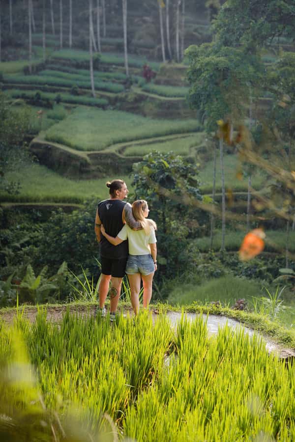 Bali: Temples, waterfall, and Rice Terrace Guided Tour - Kanto Lampo Waterfall for a cool change of pace