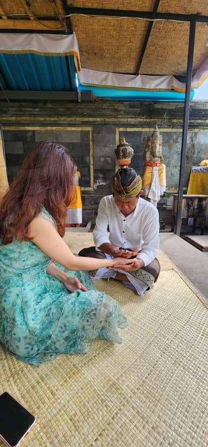 Balinese Purification at holy water temple with Local - The optional healer visit for $40