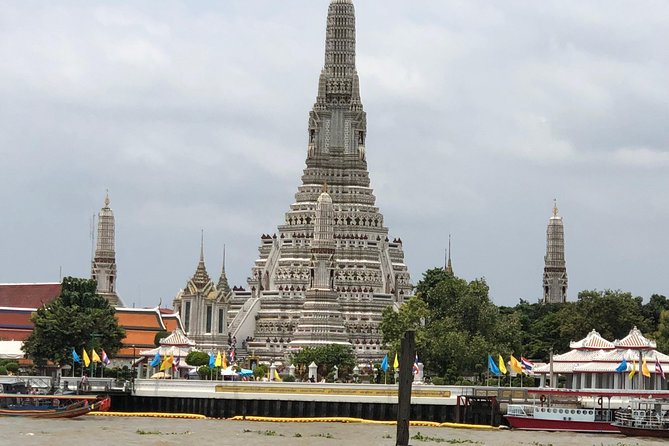Bangkok: City Highlights Temple and Market Walking Tour - Wat Arun beside the Chao Phraya