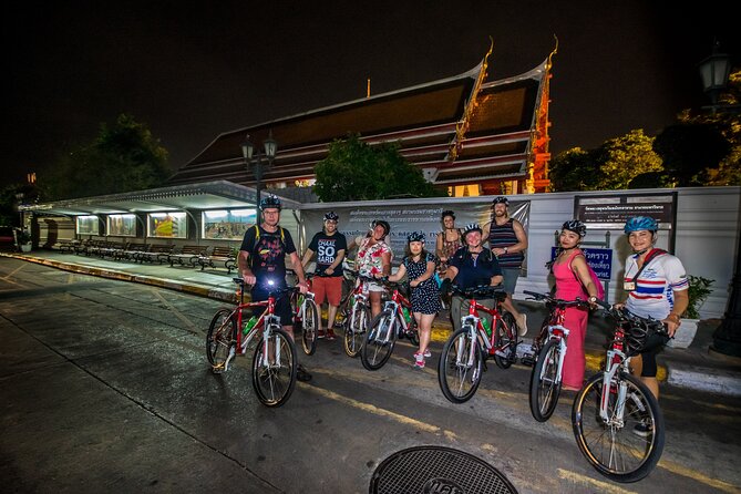 Bangkok: Night Bike Tour with Temples & Flower Market Visit - Grand Palace views and the Giant Swing