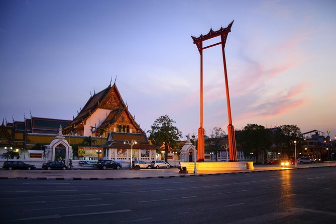 Bangkok Night Lights: Temple & City Tour by Tuk Tuk (SHA Plus) - Riding to the Giant Swing and Wat Suthat