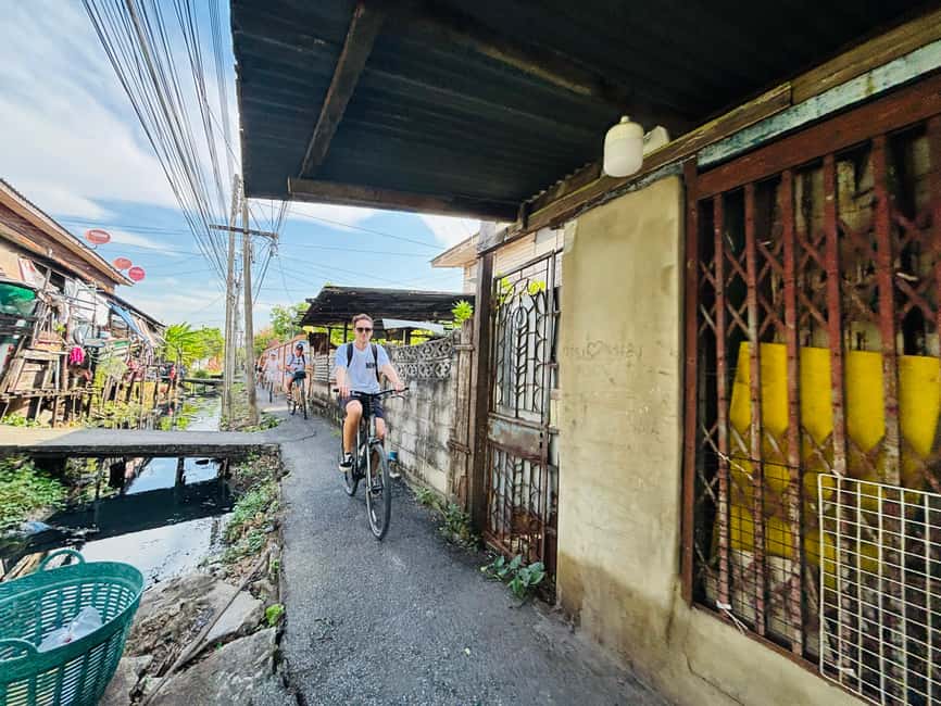 Bangkok: Temples, Canals & Local Life Bike Tour - Talat Phlu brings you into everyday Bangkok