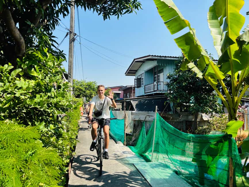 Bangkok: Temples, Canals & Local Life Bike Tour - Bikes, helmets, water, and what to wear