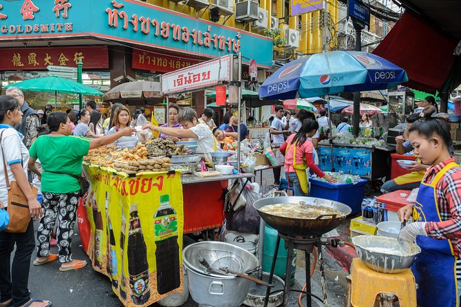 Bangkok Tuk Tuk Walk & Temple Tour With Wat Pho, Arun & Traimit - Tuk tuks, trains, and boats instead of a private van