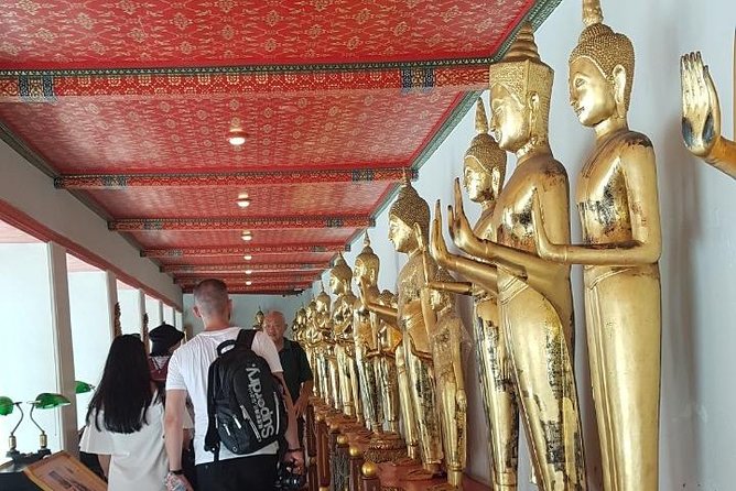 Bangkok Two Temple Tour: Wat Pho, Emerald Buddha & Grand Palace - Walking through Wat Pho