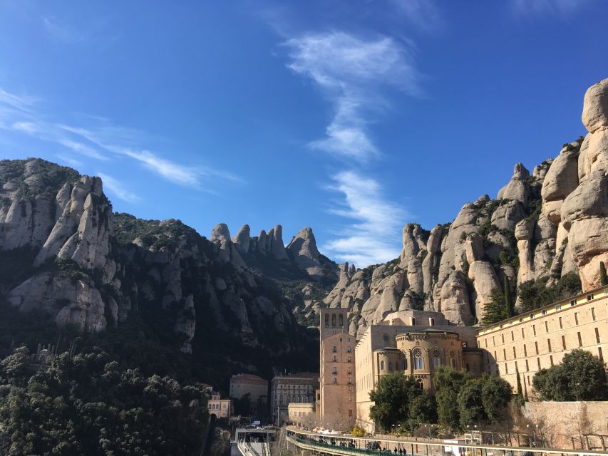 Barcelona: Half-Day Montserrat Monastery and Mountain Hike - Entering the Benedictine monastery