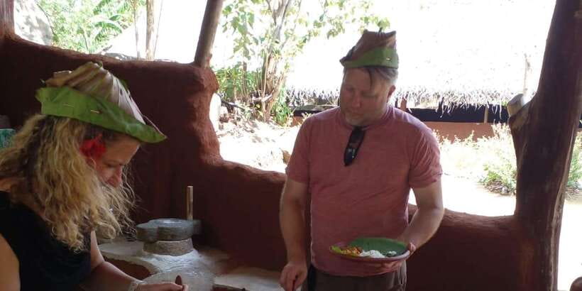 Dambulla: Caves Temple & Traditional Village Tour with Lunch - Hiriwadunna: fields, water, and a prepared village visit