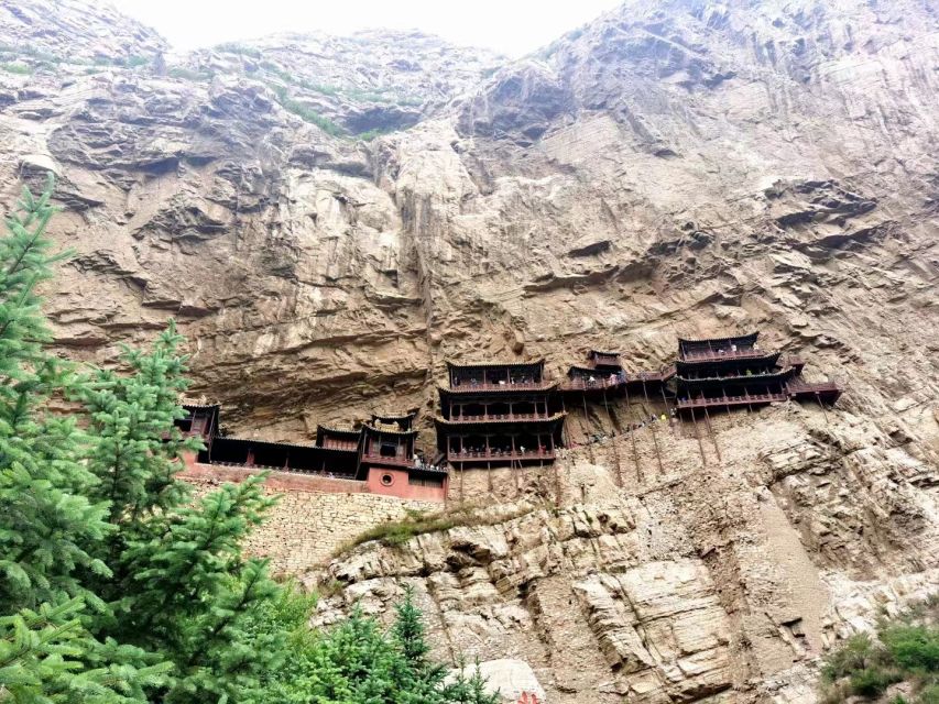 Datong: Temples and Grottoes day tour with tickets options - Entering the Hanging Monastery above the cliff