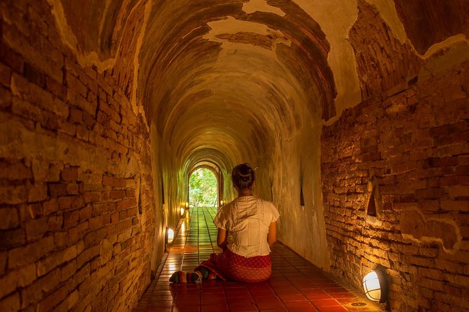 Doi Suthep and Wat Pha Lat Sunrise Tour (Small Group Only) - Exploring the tunnels at Wat Umong