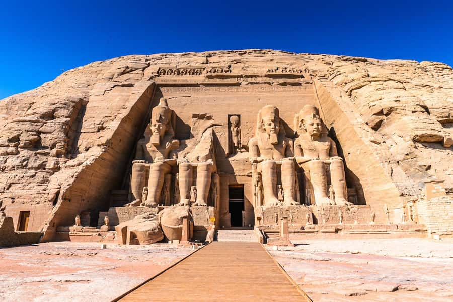 From Aswan: Abu Simbel Ramses and Nefertari Temples Day Trip - Arriving at Ramses II’s monumental temple