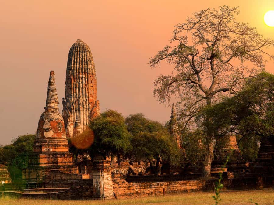 From Bangkok: Ayutthaya Temples and Boat Tour with Lunch - Seeing Ayutthaya from a long-tail boat