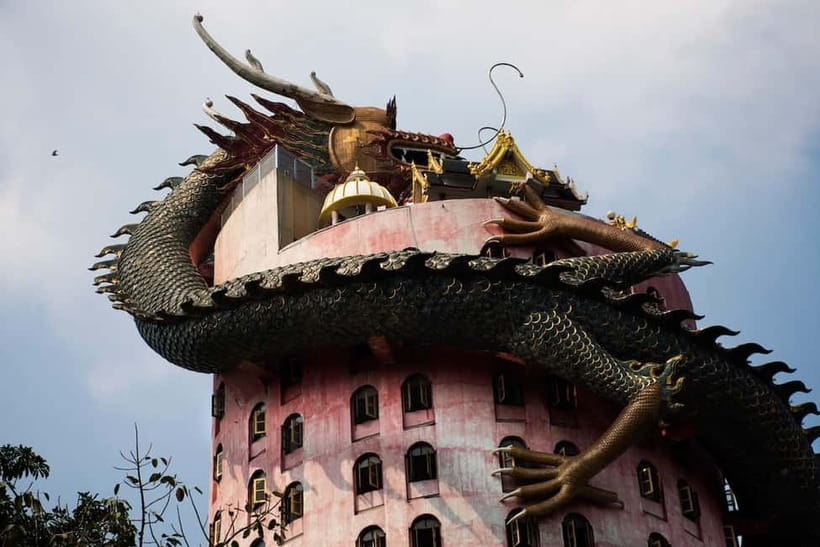 From Bangkok: Don Wai Market, Wat Samphran & Lotus Café Tour - Wat Samphran and the pink dragon tower