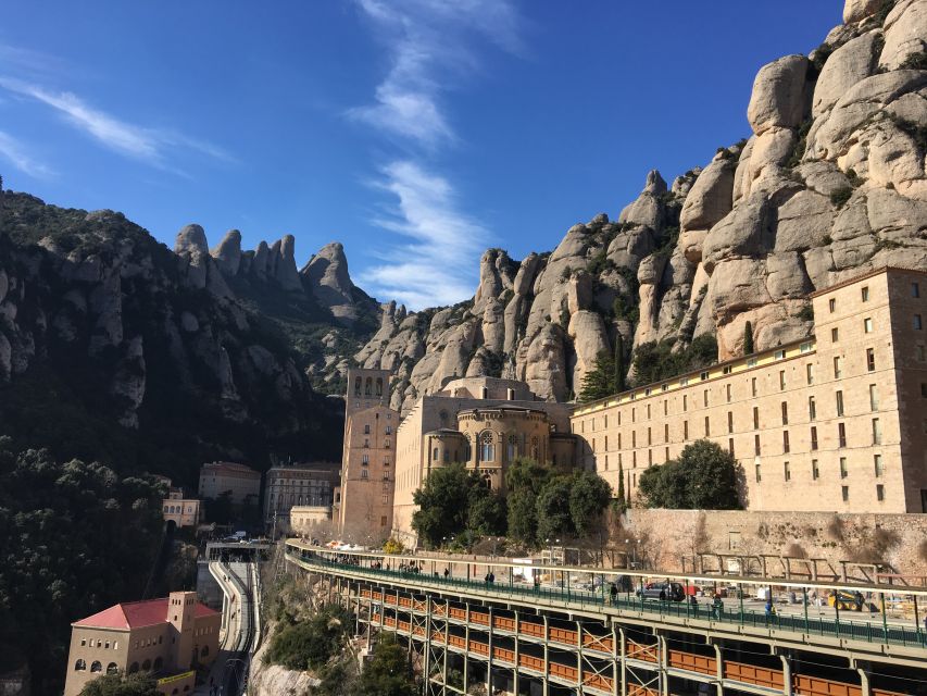From Barcelona: Montserrat Monastery & Scenic Mountain Hike - The 55-minute ride from Barcelona