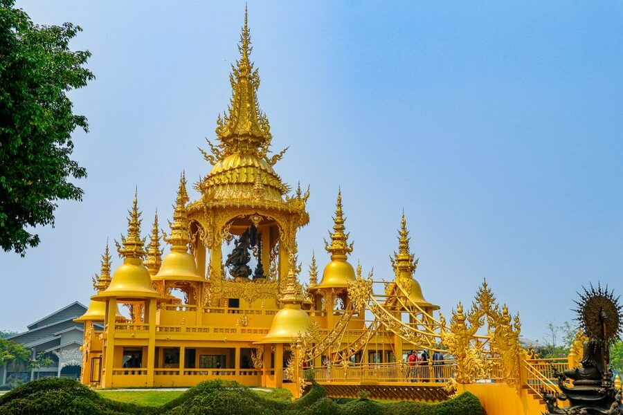 From Chiang Mai: Chiang Rai 2 Temples and Golden Triangle - Black House adds a third artistic voice