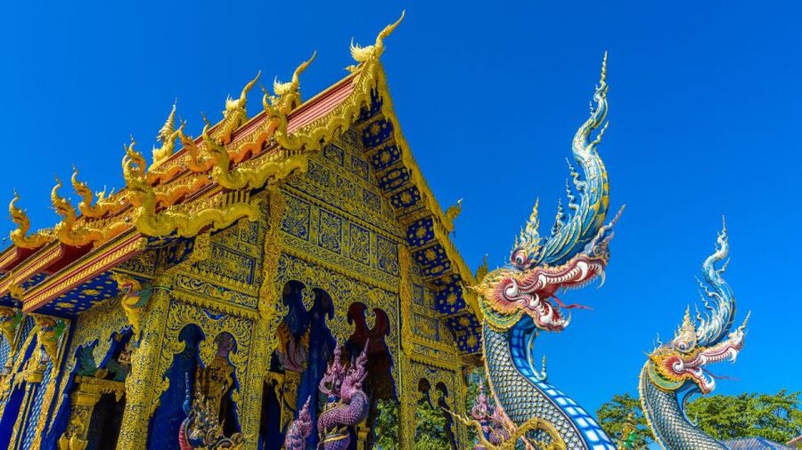 From Chiang Mai: White Temple, Blue Temple & Black House - The optional Red Temple and Lalitta Café version