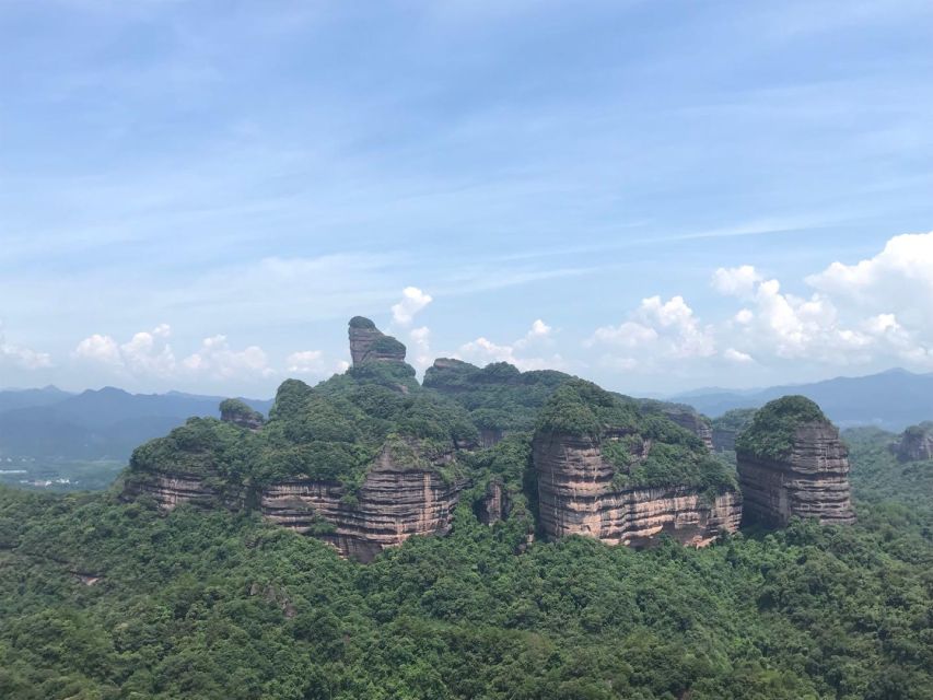 From Guangzhou: Mount Danxia and Nanhua Temple Full-Day - Climbing Zhanglao for the best views