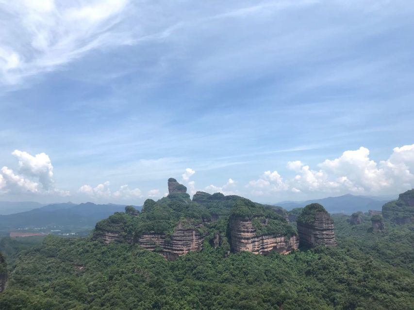 From Guangzhou: Mount Danxia and Nanhua Temple Full-Day - Yang Yuan Stone and the mountain’s playful side