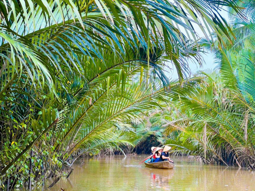 From Ho Chi Minh: Explore Mekong Delta & Vinh Trang Pagoda - Fruit, folk music, and the optional python encounter