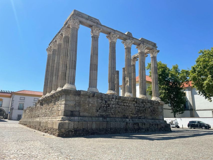From Lisbon: Évora, Chapel of Bones, & Roman Temple Tour - Jardim Público and the first taste of Évora