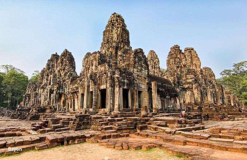 From Phnom Penh: Angkor Wat, Bayon, and Ta Prohm Day Trip - Bayon: faces, corridors, and a more enclosed mood