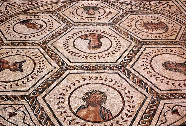 From Seville: Italica Roman City & Medieval Monastery Tour - Walking into Italica’s Roman streets