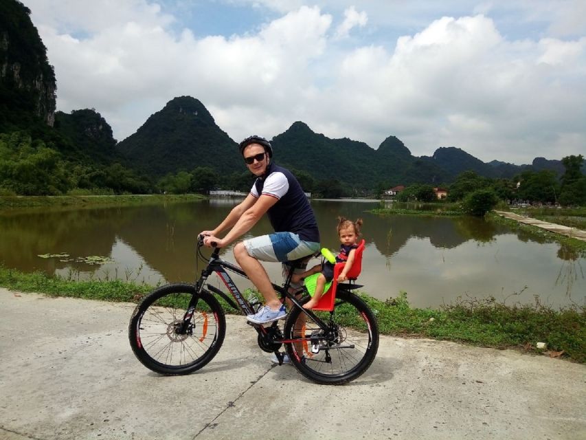Full Day Trang An, Bich Dong Pagoda, Biking & Family Visit - The Trang An sampan route