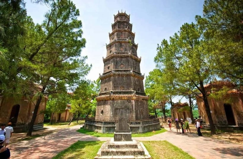 Hue: Imperial City, Royal Tombs, Pagoda & Dragon Boat Tour - Thien Mu Pagoda beside the Perfume River