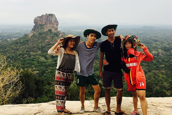 Kandy to Sigiriya Day Tour and Dambulla cave temple with private vehicle - Dambulla Cave Temple adds art, worship, and another uphill walk