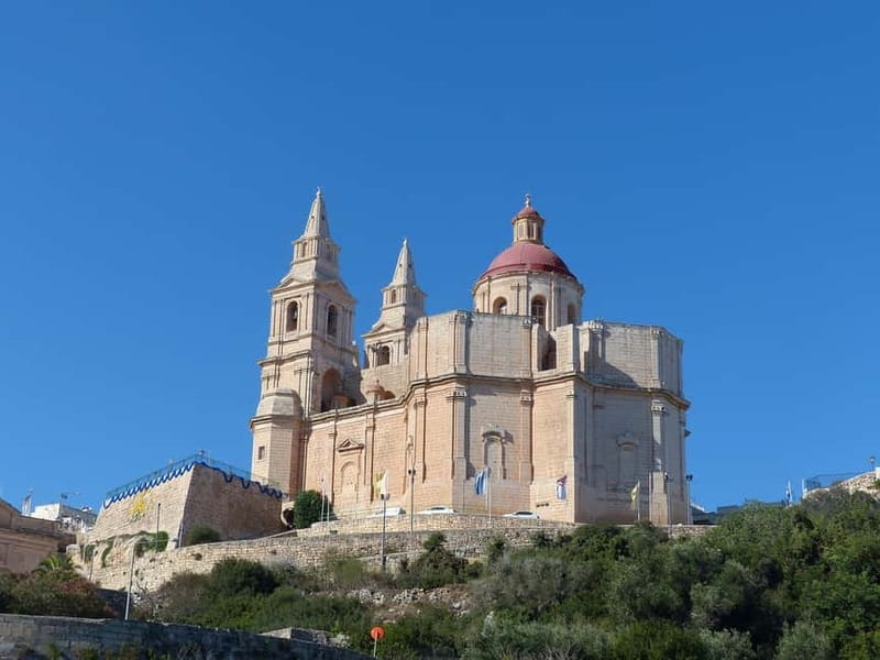 Malta: Pre-Historic Temples (Pickup, Tickets & Drop-off Inc) - Tarxien Temples among modern streets