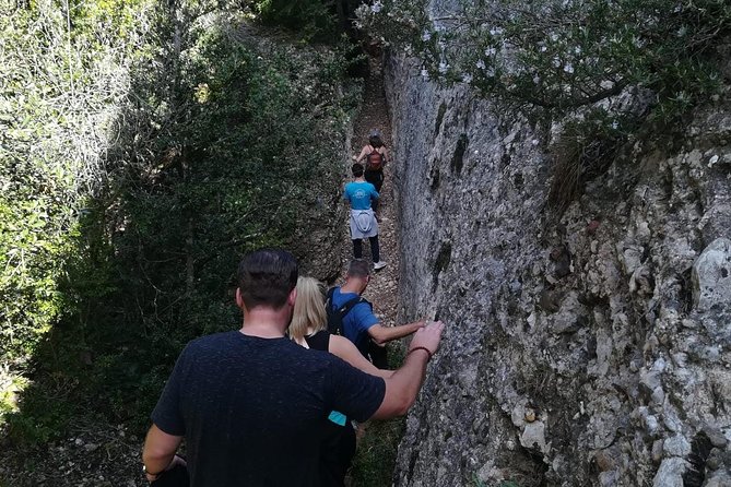 Montserrat Land of Shrines - One Day Small Group Hiking Tour from Barcelona - Riding the Sant Joan funicular uphill