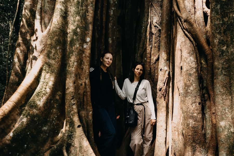 Munduk: Twin Lake Jungle Hike, Ulun Danu Temple, & Waterfall - Crossing Tamblingan Lake by traditional canoe