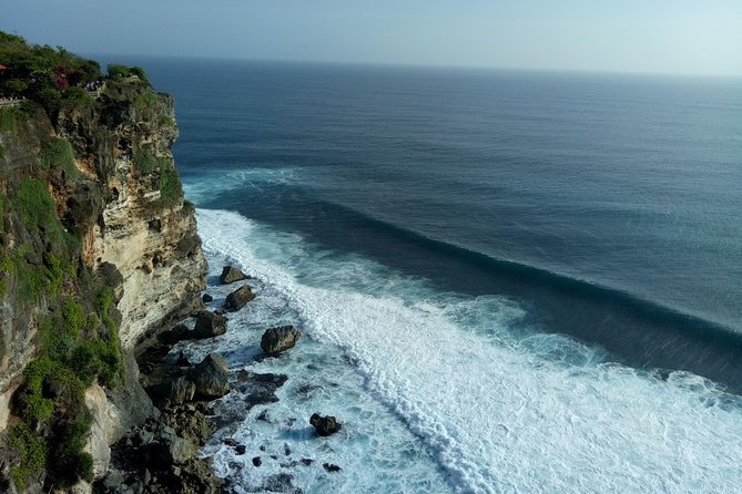Private Tour Bali Beaches and Uluwatu Temple with Dinner - Pandawa Beach for swimming and big rock views