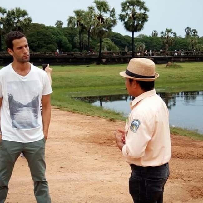 Siem Reap: 1-Day Angkor Wat Tour in Portuguese - Ta Prohm and the temple reclaimed by trees