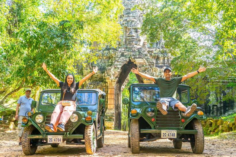 Siem Reap: Angkor Sunrise Jeep Tour / SUV Car Available - Bayon and Angkor Thom, where stone faces change the mood