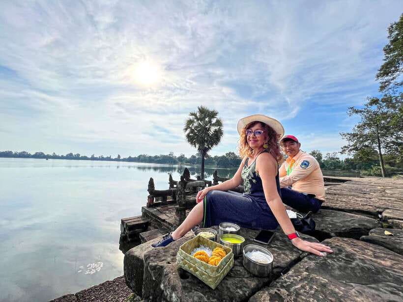 Siem Reap: Angkor Wat Sunrise Tour via Tuk Tuk & Breakfast - Bayon’s smiling faces and Angkor Thom’s Victory Gate