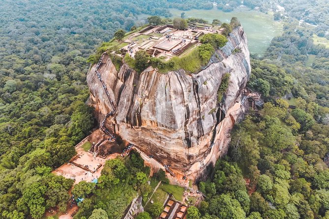 Sigiriya Rock and Dambulla Cave Temple Day Tour - Sigiriya Rock is the day’s demanding centerpiece