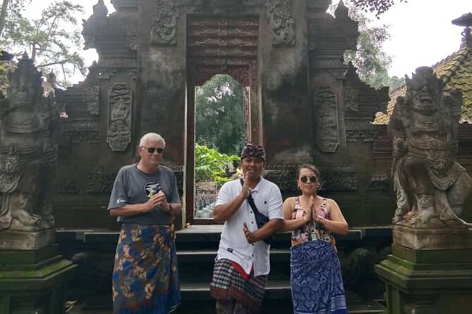 Skip the Line Tirta Empul Temple Entrance Ticket All Inclusive - The purification ritual at the holy springs