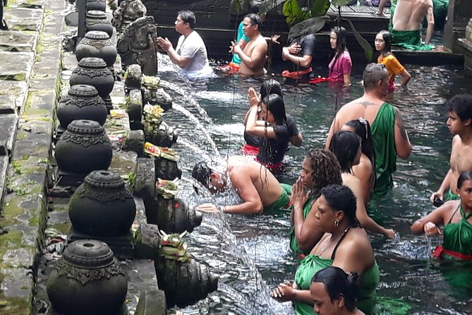 Skip the Line Tirta Empul Temple Entrance Ticket All Inclusive - Entering Tirta Empul with the right clothing