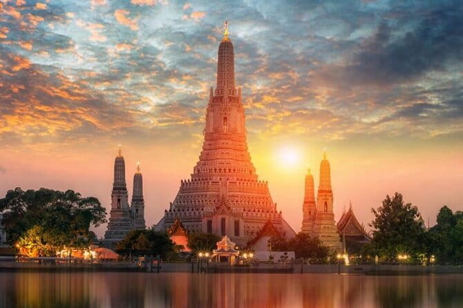 Three Temple River Cruise with Wat Pho, Wat Arun and Wat Rakhang - Finishing at Wat Arun in Thai dress