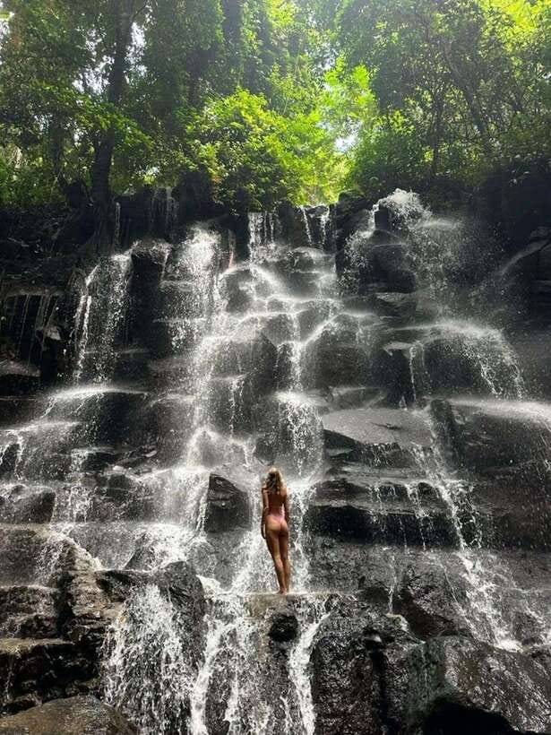 Ubud: Water Temple, Rice Terrace, and Waterfalls Tour - Tegallalang Rice Terrace begins the sightseeing